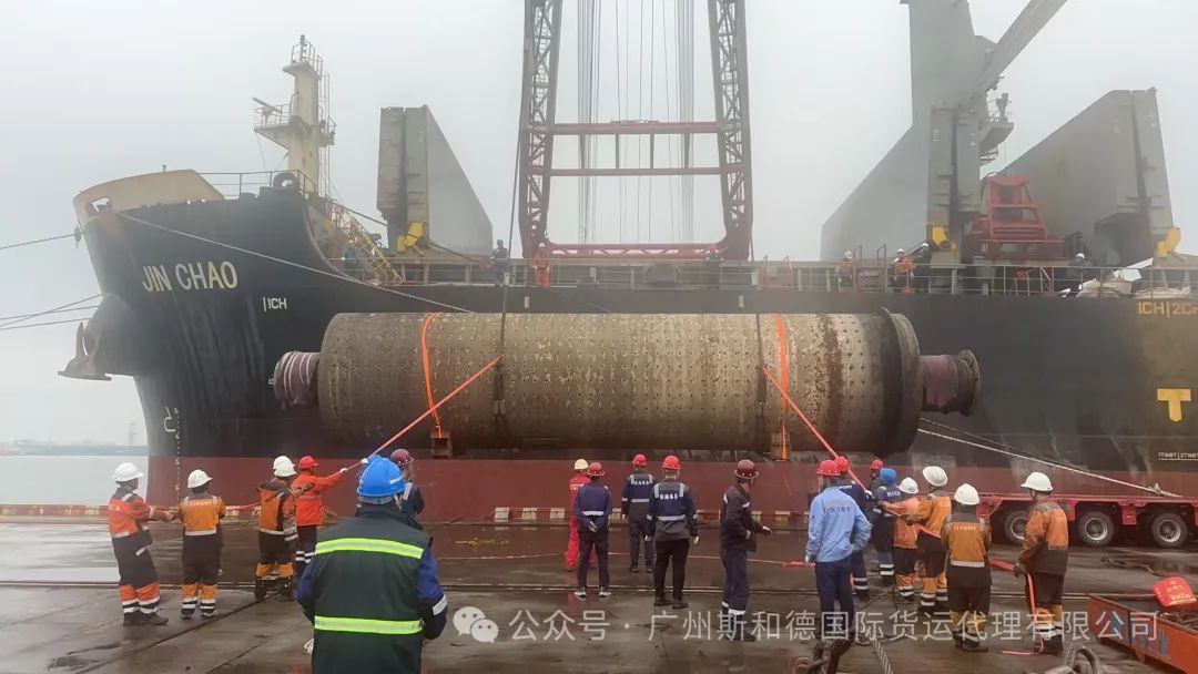 Ball mill cargo arriving alongside break bulk vessel M/V JIN CHAO